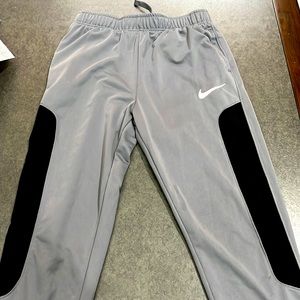 Gray Nike brand jogger, sweatpants. Large youth size . Dri fit